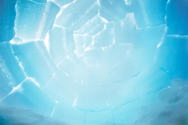 Close-up of cracked blue and white ice surface